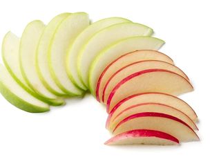 Photo: Green red apple slices white