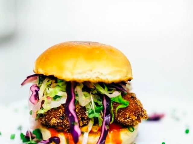 Illustrative photo of a fried fish sandwich with slaw