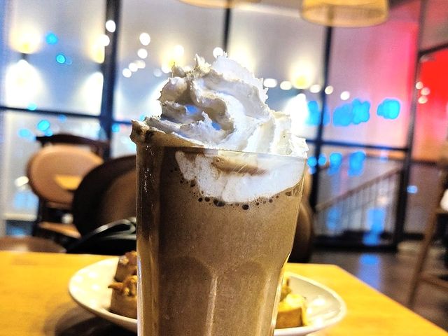 Illustrative photo of a chocolate frappe topped with whipped cream
