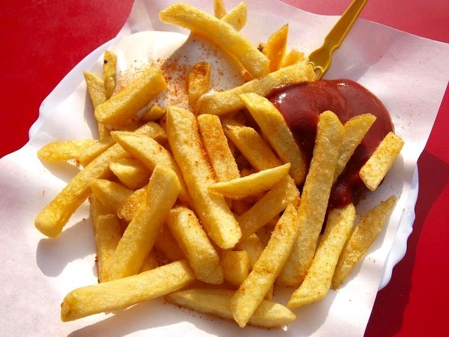 Illustrative photo of french fries with ketchup