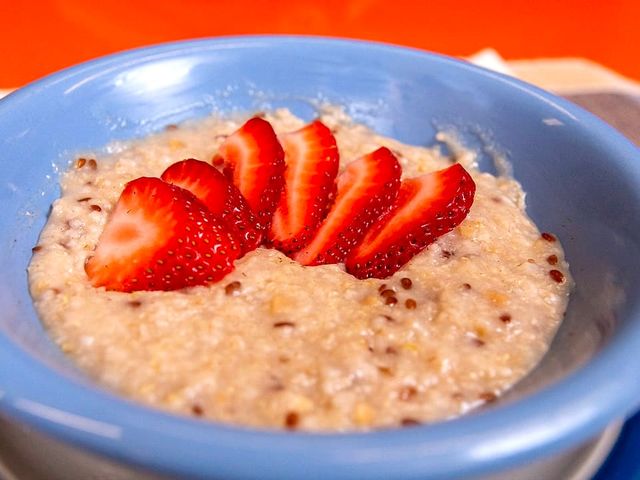 Illustrative photo of oatmeal topped with strawberries