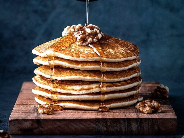 Illustrative photo of a stack of pancakes with syrup